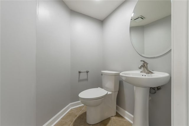 600 E Admiral Blvd Unit 601, Kansas City, MO 64106 - half bath with toilet, baseboards, and tile patterned flooring