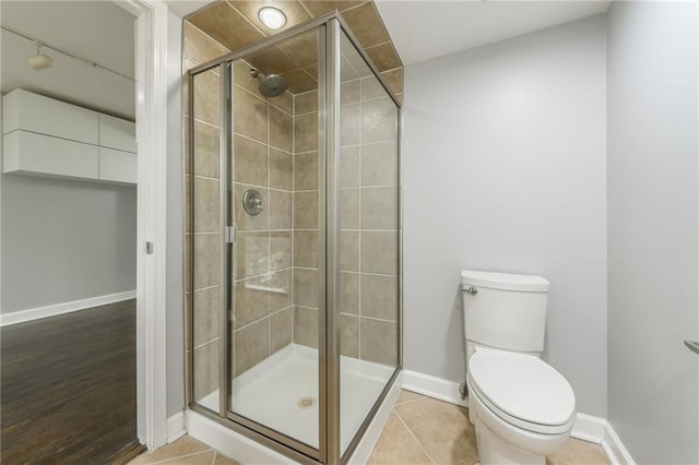 600 E Admiral Blvd Unit 601, Kansas City, MO 64106 - full bathroom with toilet, a shower stall, and baseboards