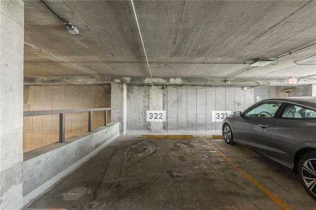 600 E Admiral Blvd Unit 601, Kansas City, MO 64106 - parking deck featuring a garage door opener