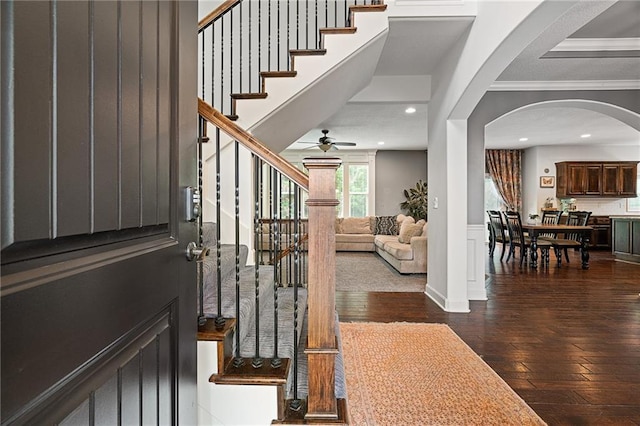 16154 S Canton St, Gardner, KS 66030 - entryway with dark wood finished floors, stairway, arched walkways, a ceiling fan, and recessed lighting
