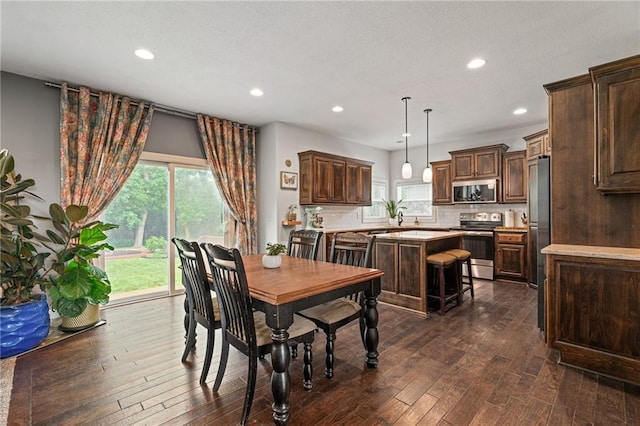 16154 S Canton St, Gardner, KS 66030 - dining room featuring recessed lighting and dark wood finished floors