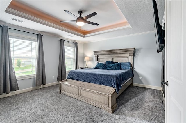 16154 S Canton St, Gardner, KS 66030 - bedroom featuring a tray ceiling, ornamental molding, carpet, and a ceiling fan