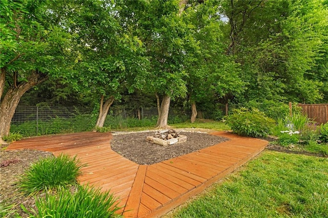 16154 S Canton St, Gardner, KS 66030 - wooden terrace featuring a fire pit