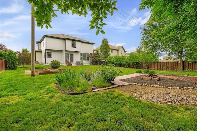 16154 S Canton St, Gardner, KS 66030 - back of property with a fenced backyard and entry steps