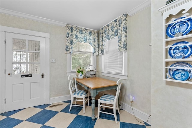 1809 Main St, Lexington, MO 64067 - dining area featuring ornamental molding and tile patterned floors