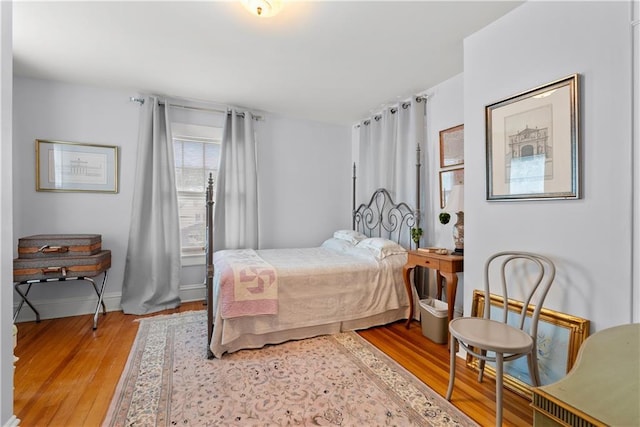 1809 Main St, Lexington, MO 64067 - bedroom with light wood finished floors and baseboards