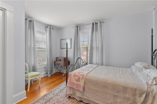 1809 Main St, Lexington, MO 64067 - bedroom featuring light wood-style floors and baseboards