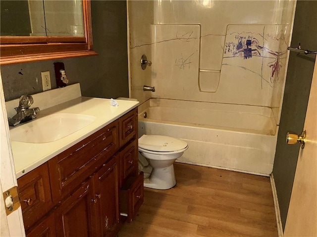 13 Oak Crest Dr, Linn Valley, KS 66040 - bathroom featuring wood finished floors, vanity, toilet, and shower / washtub combination