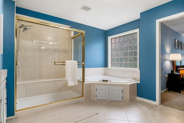 14810 W 72nd St, Shawnee, KS 66216 - full bath with a bath, a stall shower, and tile patterned floors
