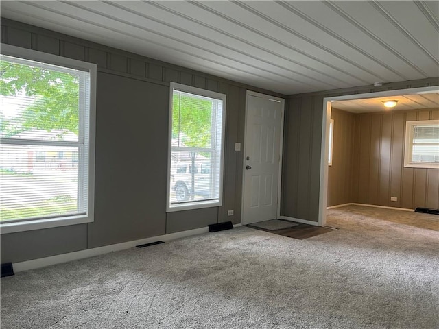 203 N Connor St, Odessa, MO 64076 - carpeted foyer entrance featuring baseboards