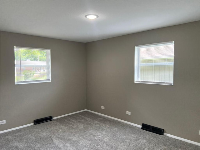 203 N Connor St, Odessa, MO 64076 - carpeted empty room featuring baseboards