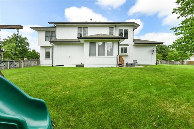 21835 W 175th Ter, Olathe, KS 66062 - back of house featuring a fenced backyard and a playground