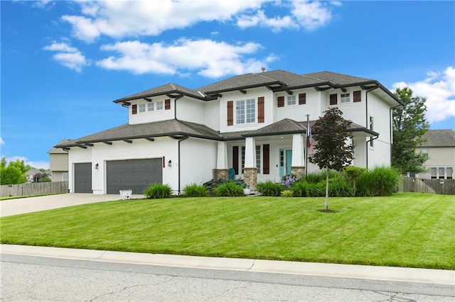 21835 W 175th Ter, Olathe, KS 66062 - view of front of home with concrete driveway, stucco siding, and an attached garage