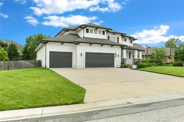 21835 W 175th Ter, Olathe, KS 66062 - prairie-style house with an attached garage, driveway, stucco siding, and a shingled roof