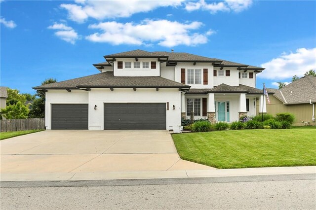 21835 W 175th Ter, Olathe, KS 66062 - prairie-style house with concrete driveway, stucco siding, and an attached garage
