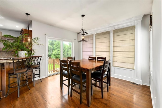 21835 W 175th Ter, Olathe, KS 66062 - dining space featuring dark wood-style flooring and recessed lighting