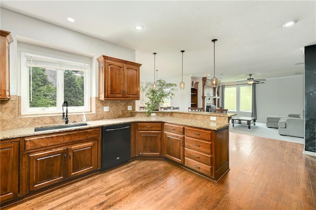 21835 W 175th Ter, Olathe, KS 66062 - kitchen featuring black dishwasher, a peninsula, light stone countertops, a ceiling fan, and recessed lighting