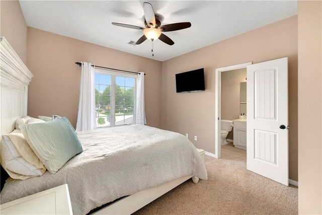 21835 W 175th Ter, Olathe, KS 66062 - bedroom featuring light colored carpet, ensuite bathroom, and ceiling fan