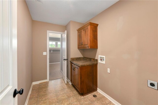 21835 W 175th Ter, Olathe, KS 66062 - laundry area featuring hookup for an electric dryer, cabinet space, and hookup for a washing machine