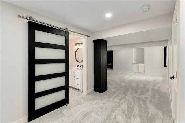 21835 W 175th Ter, Olathe, KS 66062 - foyer with light colored carpet, a barn door, and recessed lighting