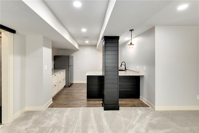 21835 W 175th Ter, Olathe, KS 66062 - bar area featuring freestanding refrigerator, dark colored carpet, recessed lighting, and hanging light fixtures