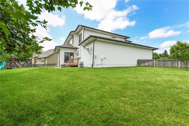21835 W 175th Ter, Olathe, KS 66062 - rear view of property with a playground