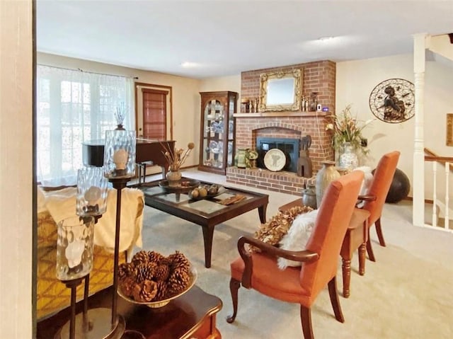 305 E Partridge Ave, Independence, MO 64055 - carpeted living area featuring a brick fireplace
