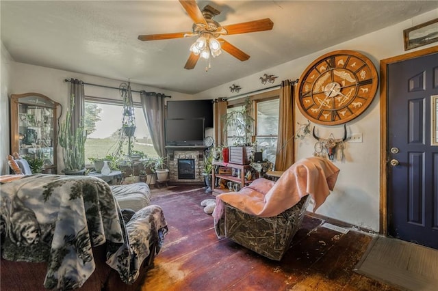 43574 E 224th St, Cowgill, MO 64637 - living room featuring wood finished floors, a ceiling fan, and a fireplace
