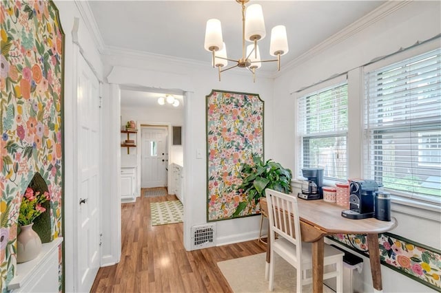 617 E 64th Ter, Kansas City, MO 64131 - office featuring light wood-style floors, a chandelier, ornamental molding, and baseboards