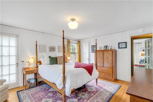 617 E 64th Ter, Kansas City, MO 64131 - bedroom featuring light wood finished floors