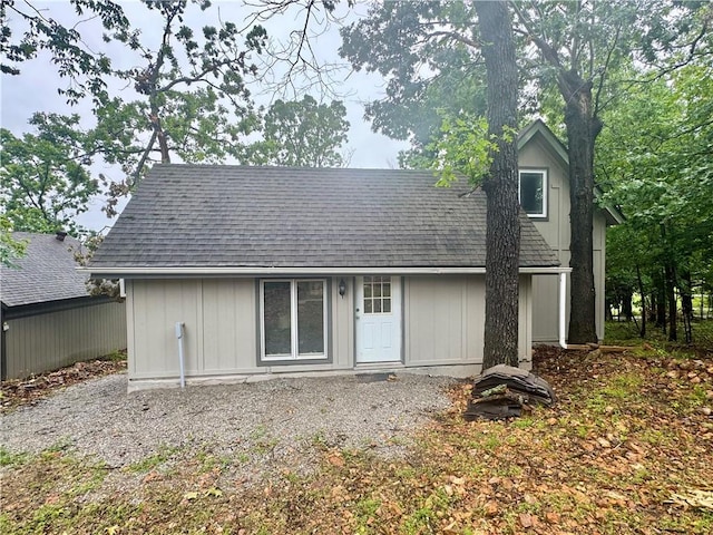 10057 Otter Rd, Clinton, MO 64735 - rear view of house featuring roof with shingles