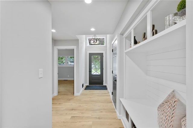 11917 W 66th St, Shawnee, KS 66216 - mudroom featuring light wood-type flooring, recessed lighting, and a chandelier