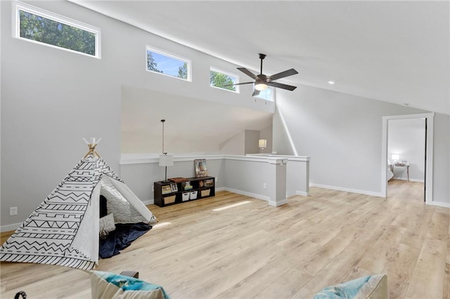 11917 W 66th St, Shawnee, KS 66216 - recreation room featuring ceiling fan, vaulted ceiling, and wood finished floors