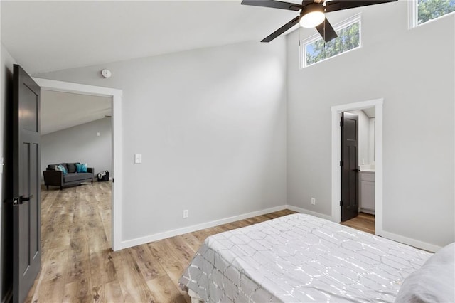 11917 W 66th St, Shawnee, KS 66216 - bedroom with lofted ceiling, light wood-style floors, and ceiling fan
