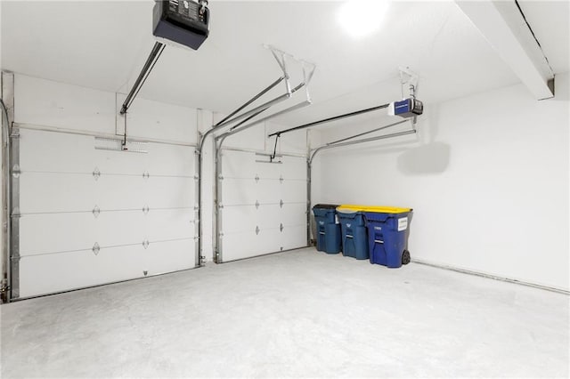 11917 W 66th St, Shawnee, KS 66216 - garage featuring a garage door opener
