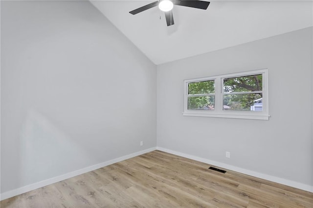 11917 W 66th St, Shawnee, KS 66216 - unfurnished room with lofted ceiling, ceiling fan, and wood finished floors