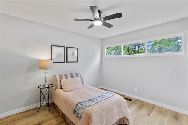 11917 W 66th St, Shawnee, KS 66216 - bedroom featuring wood finished floors and ceiling fan