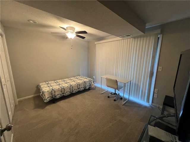 8237 N Chatham Ave, Kansas City, MO 64151 - bedroom with carpet floors, baseboards, and a ceiling fan