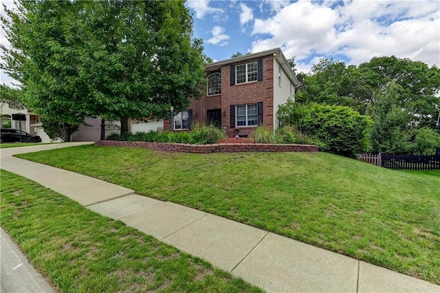 3403 E Devonshire Dr, Saint Joseph, MO 64506 - view of front of house featuring brick siding, driveway, and an attached garage