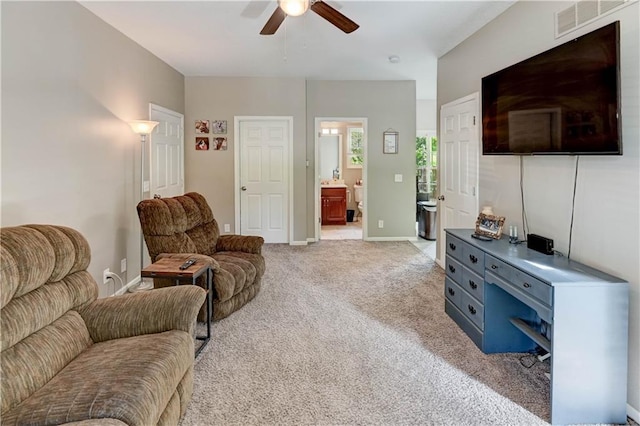 3403 E Devonshire Dr, Saint Joseph, MO 64506 - living area featuring ceiling fan and light carpet