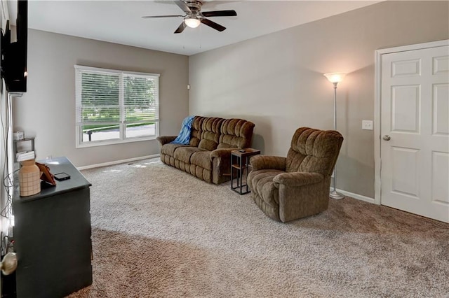 3403 E Devonshire Dr, Saint Joseph, MO 64506 - living area with carpet flooring, ceiling fan, and baseboards