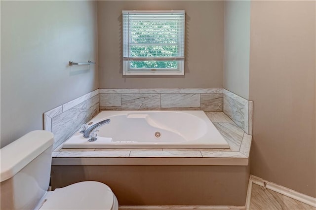 3403 E Devonshire Dr, Saint Joseph, MO 64506 - full bathroom featuring toilet and a whirlpool tub