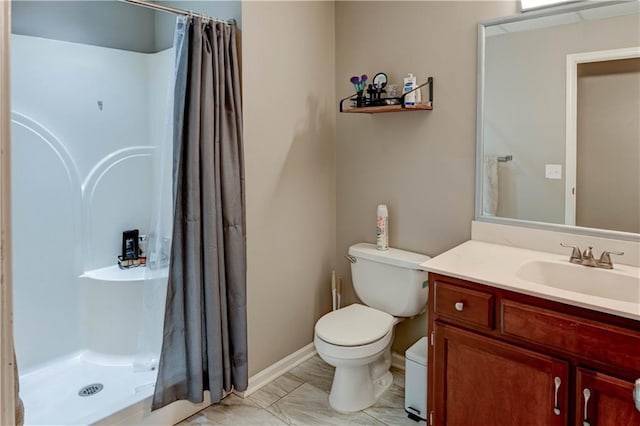 3403 E Devonshire Dr, Saint Joseph, MO 64506 - bathroom with toilet, vanity, curtained shower, and baseboards
