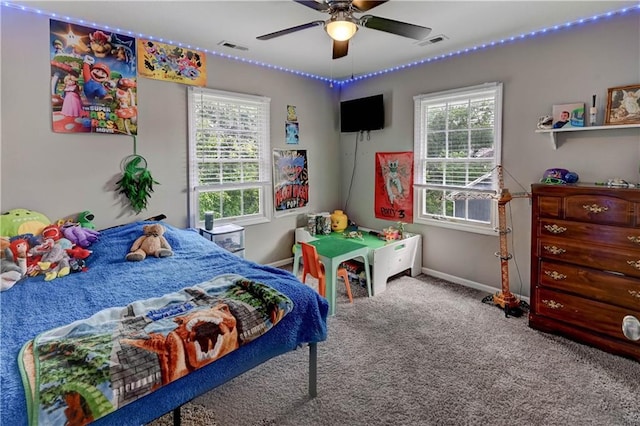 3403 E Devonshire Dr, Saint Joseph, MO 64506 - carpeted bedroom featuring baseboards and a ceiling fan