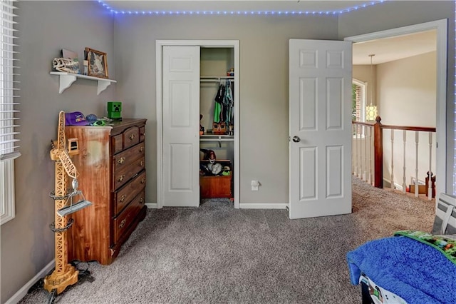 3403 E Devonshire Dr, Saint Joseph, MO 64506 - bedroom with carpet floors, baseboards, and a closet