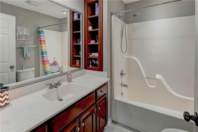3403 E Devonshire Dr, Saint Joseph, MO 64506 - bathroom with toilet, vanity, and shower / bath combo with shower curtain