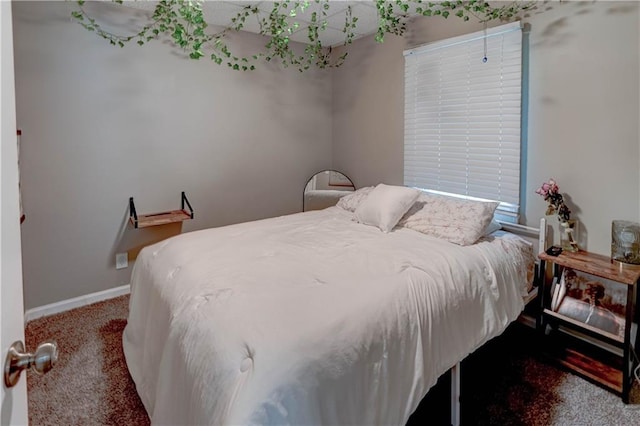 3403 E Devonshire Dr, Saint Joseph, MO 64506 - bedroom with carpet floors and baseboards