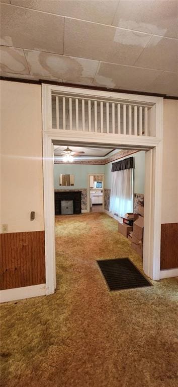 423 S Minnesota Ave, Columbus, KS 66725 - hall with carpet floors and a paneled ceiling