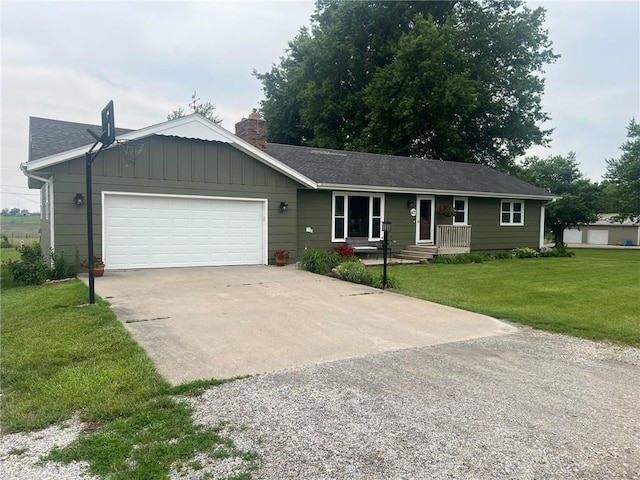 605 Queen St, King City, MO 64463 - single story home with an attached garage, concrete driveway, a chimney, a front lawn, and board and batten siding