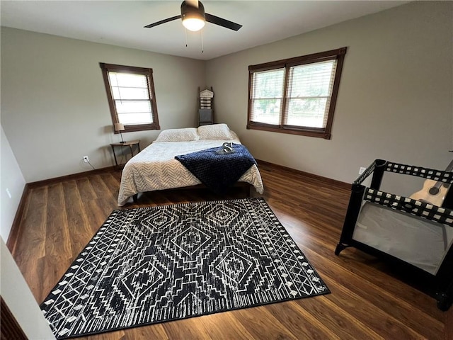 605 Queen St, King City, MO 64463 - bedroom with baseboards, wood finished floors, and a ceiling fan